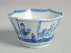 A SMALL CHINESE BLUE AND WHITE OCTAGONAL PORCELAIN CUP, painted with figures in a garden, 7cm