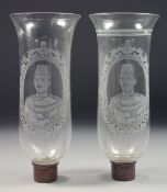 TWO OTTOMAN EGYPTIAN GLASS LAMP SHADES, both depicting a portrait of Abbas Hilmi Pasha, 27.5cm high,