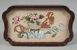 A CHINESE RECTANGULAR PORCELAIN BRUSH WASHER / DISH, the centre with raised decoration depicting a