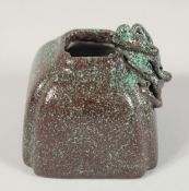 A CHINESE SPECKLED TURQUOISE GLAZE INK POT, the shoulder with moulded chilong, with gilt