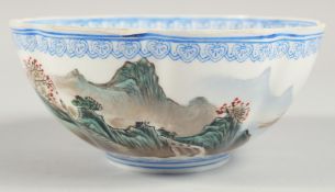 A CHINESE EGGSHELL PORCELAIN RIBBED BOWL, the exterior decorated with mountainous landscape, the