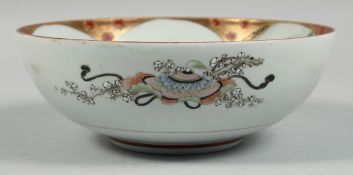 A GOOD JAPANESE KUTANI PORCELAIN BOWL, the interior painted with a scene of a seated elderly