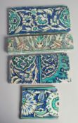 A COLLECTION OF FOUR 16TH/17TH CENTURY OTTOMAN DAMASCUS GLAZED POTTERY BORDER TILES, each with