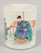 A CHINESE FAMILLE VERTE PORCELAIN BRUSH POT, painted with a dignitary and attendant, 12.5cm high.