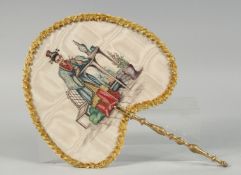 A CHINESE EMBROIDERED SILK FAN with wooden handle, 41cm long.