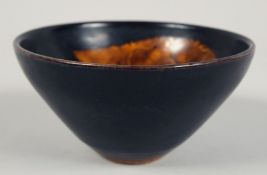 A JIZHOU KILN POTTERY BOWL, 12cm diameter.