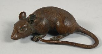 A JAPANESE BRONZE FIGURE OF A RAT, signed to underside, 9cm long.