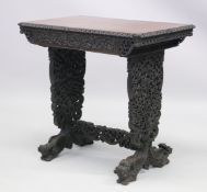 A FINE ANGLO INDIAN RECTANGULAR WRITING TABLE, with finely carved edge, a single frieze drawer