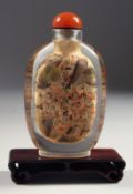 A LARGE CHINESE REVERSE-PAINTED SNUFF BOTTLE AND AGATE STOPPER, together with hardwood stand. Bottle