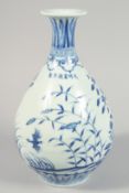 A CHINESE BLUE AND WHITE PORCELAIN YUHUCHUNPING VASE decorated with birds and native flora,