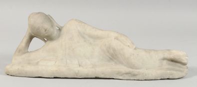 A TIBETAN CARVED MARBLE BUDDHISTIC FIGURE, 48cm long.