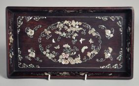A FINE CHINESE MOTHER OF PEARL INLAID FOOTED RECTANGULAR TRAY, with a central oval of foliate