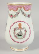 A SAMSON FAMILLE ROSE PORCELAIN TANKARD with a central armorial and floral sprays. 17cm high