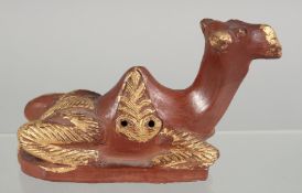 A TURKISH TOPHANE CAMEL FORMED FOOT SCRAPER, 12.5cm long.