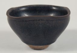 A CHINESE HARE'S FUR GLAZE POTTERY BOWL, 12.5cm at widest point.