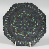 A PERSIAN ENAMELLED SILVER DISH, the embossed and chased dish with foliate enamelled decoration,