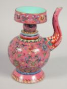 A CHINESE TIBETAN-STYLE PORCELAIN BENBA WINE POT AND COVER, decorated with floral motifs and