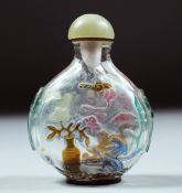 A SUPERB CHINESE ROCK CRYSTAL SNUFF BOTTLE AND JADE STOPPER, with carved and stained decoration
