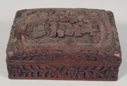A CHINESE CINNABAR LACQUER BOX AND COVER, the lid with a panel of figures in an outdoor setting, the