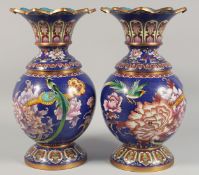 A LARGE PAIR OF CHINESE BLUE GROUND CLOISONNE VASES AND COVERS, the covers with petal-formed rim,