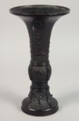 A CHINESE ARCHAIC STYLE BRONZE GU VASE, 25cm high.