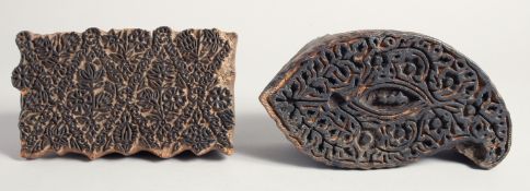 TWO 19TH CENTURY INDO PERSIAN KALAMKARI WOODEN PRINTING BLOCKS, carved with foliate design, 18cm x