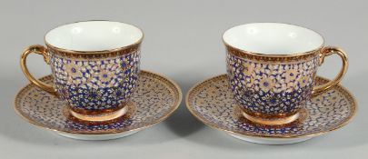 A BOXED SET OF TWO PIPATANA BENJARONG THAI HAND PAINTED PORCELAIN CUPS AND SAUCERS, each piece