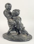 A LARGE JAPANESE MEIJI PERIOD BRONZE STATUE of boys play-fighting, the figures upon an oval form