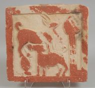 A RARE EARLY INDIAN ENGRAVED RED STONE TILE, possibly Kushan, depicting a deer and mother, 31cm x