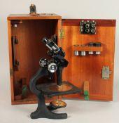 A BECK LONDON BLACK AND CHROME MICROSCOPE, No. 11965. 13ins in a mahogany case.