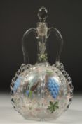 A 19TH CENTURY DUTCH GLASS TWO HANDLED DECANTER AND STOPPER painted with birds and grapes. 11ins