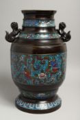 A LARGE CHINESE BRONZE AND CLOISONNE ENAMEL VASE with lion handles. 15ins high.