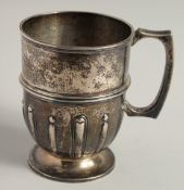 A VICTORIAN SEMI FLUTED HALF PINT MUG. Engraved Sheffield 1897.