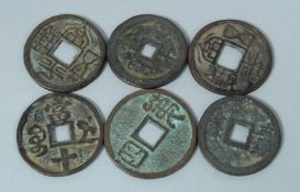 SIX CHINESE COINS.