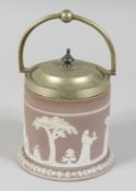 A WEDGWOOD JASPER WARE CIRCULAR BISCUIT CADDY AND COVER.