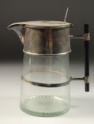 A CHRISTOPHER DRESSER DESIGN CLARET JUG.