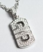 A BULGARI PENDANT AND CHAIN in a Bulgari box.