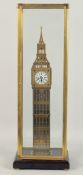 A GOOD SKELETON CLOCK OF BIG BEN in a glass case. 1ft 10ins high.