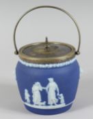A WEDGWOOD JASPER WARE CIRCULAR BISCUIT CADDY AND COVER.