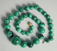 A MALACHITE NECKLACE.