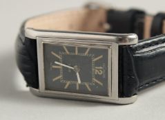 A GOOD JAEGER LECOULTRE DUOPLAN UNISEX WRISTWATCH with black dial, no. 51988 with leather strap.
