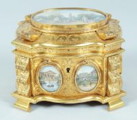A SUPERB GILT CASKET with engraved decoration and silk lined interior, mounted with famous scenes
