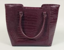 A LARGE GREY PLAIN LEATHER BAG. 14ins x 14ins