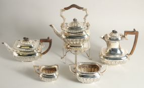 A GOOD SILVER FIVE PIECE TEA SET with spirit kettle and stand, tea pot, hot water jug, sugar basin