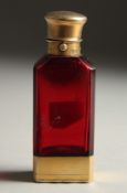 A VICTORIAN RUBY GLASS SILVER MOUNTED FLASK VINAIGRETTE. 3.5ins long. London 1863
