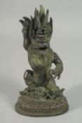 A SMALL CHINESE ANGRY GOD BRONZE FIGURE