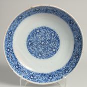 AN 18TH CENTURY DELFT BLUE AND WHITE CIRCULAR DISH. 11ins high.