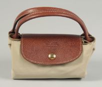 A LONGCHAMP BAG with two handles.