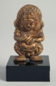 AN INDIAN BRONZE GOD on a marble base 7cm