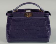 A FENDI MAUVE CROCODILE HANDBAG. 9ins x 6.5ins
